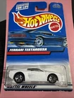 HOT WHEELS FERRARI TESTAROSSA ON CARD.