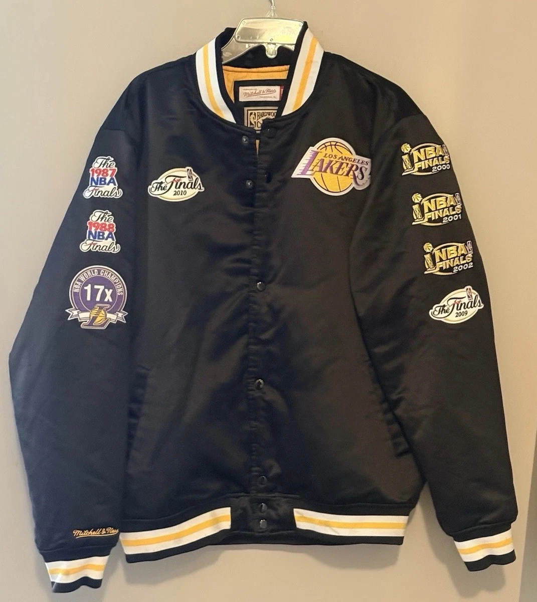 Preços baixos em Mitchell & Ness Los Angeles Lakers jaquetas de