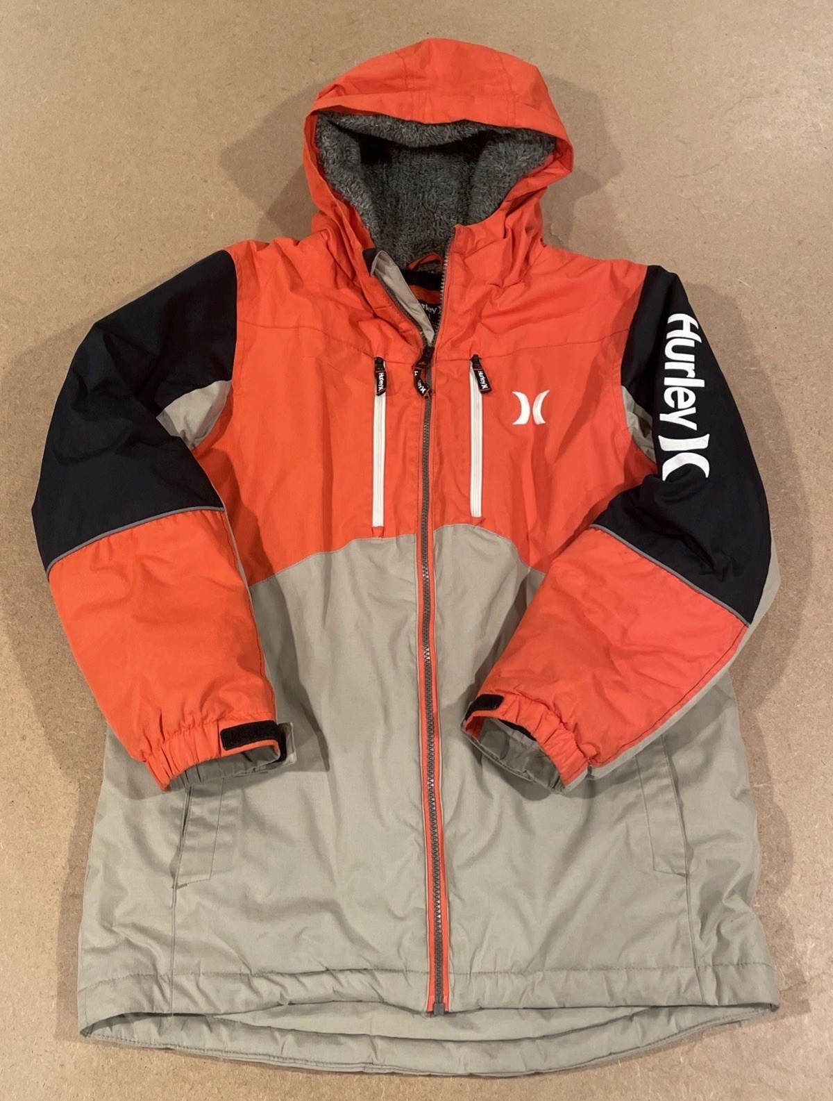 Jacket Size Large. Tan Orange Black