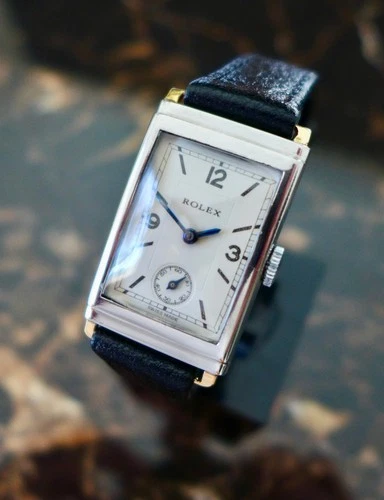 A STUNNING VINTAGE  1930s ROLEX  RECTANGULAR "TANK" R. 1936  IN S/STEEL & GOLD