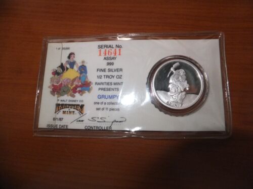 Walt Disney's Snow White 50th Anniversary "GRAMPY" 1/2 troy oz .999 Silver.