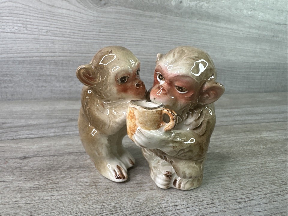 A monkey sipping coffee as a salt & pepper set — rare Japan-marked mid-century ceramic that's simultaneously absurd and charming.