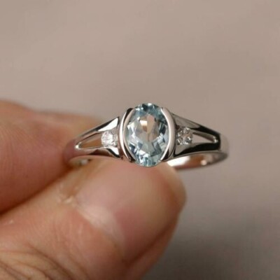 Fancy Aquamarine Color Oval Cut Simulated CZ Half Bezel 925 Sterling Silver Ring