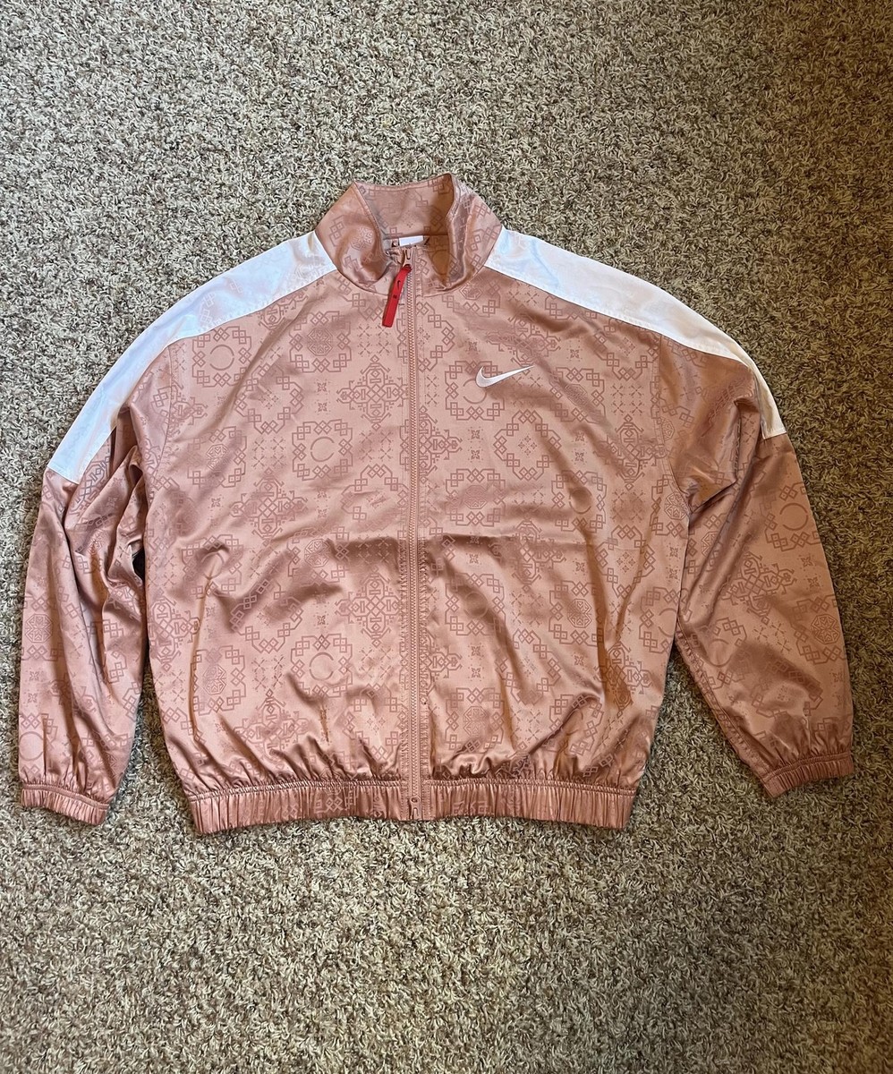 nike rose gold windbreaker
