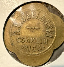 Token  Conklin, Michigan  R.L. JABLONSKI  5¢  IN TRADE	Brass
