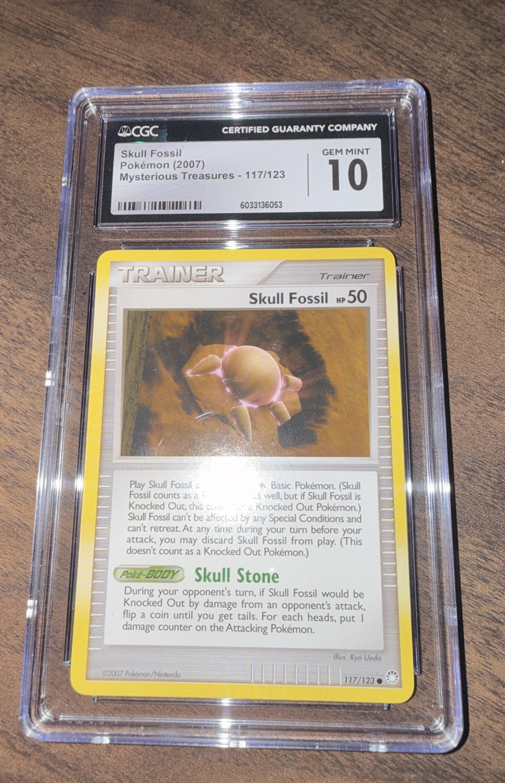 Pokemon TCG CGC 10 Gem Mint Skull Fossil 117/123 Mysterious Treasures Regular