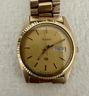 Vintage 80’sSeiko Quartz Men's Gold Tone Wristwatch Gold Metal Bracelet Day/Date
