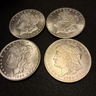 4 Morgan Silver Dollars. 1880-O, 1888-O, 1889-O, 1889-O.