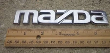 Mazda trunk emblem badge decal logo chrome rear 3 6 626 Protege OEM Genuine