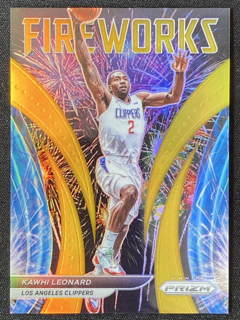 Kawhi Leonard 2021-22 Panini Prizm Fireworks Gold Prizm /10 #7
