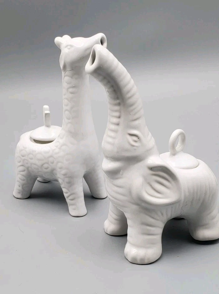 Pottery Barn White Giraffe And Elephant Oil And Vinegar Set Of Pitchers