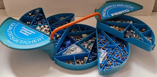 FESTO case with lot of pneumatic couplings, fittings, filters and much more.