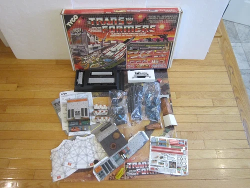 VTG 1985 Transformers G1 Tyco Electric Train & Battle Set w/ 38 Figures - Box