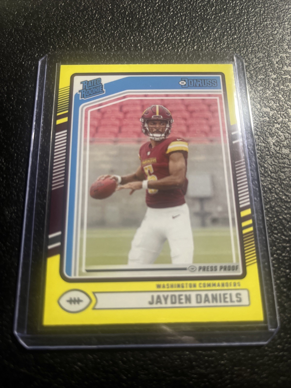 2024 Panini Donruss - Rated Rookie Jayden Daniels #389 Press Proof Yellow (RC)