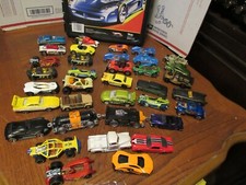 large Lot of 36 Hot Wheels Vehicles cars/trucks With Case