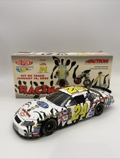 Action 2004 Jeff Gordon DuPont/Racing Stripes Monte Carlo 1/24 Scale Diecast Car