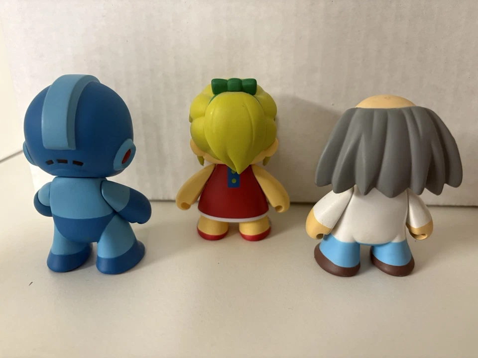 Mega Man Kidrobot Lot of 9 Figures With Dr Wily Roll Cut Man Guts Man - Image 3 of 4