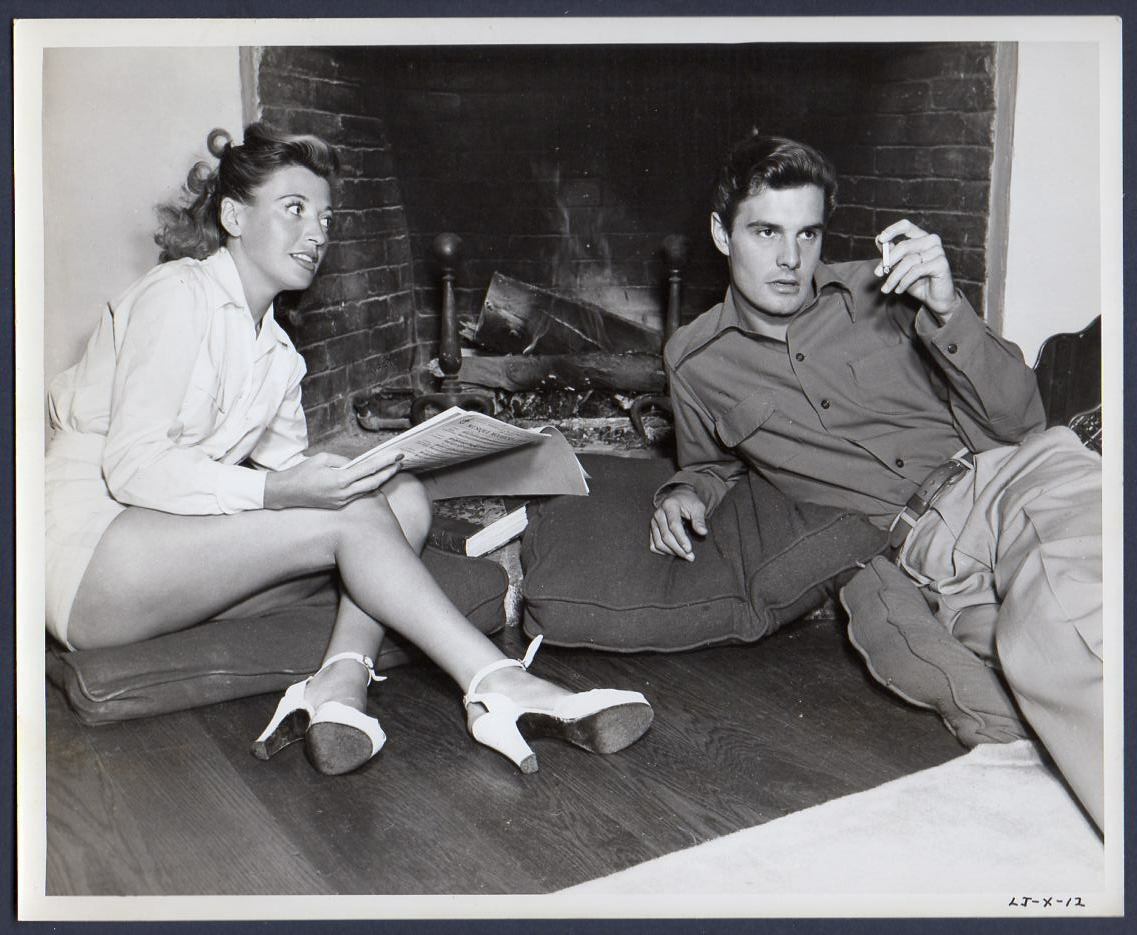 LOUIS JOURDAN leggy wife Berthe by fireplace Orig Photo HANDSOME