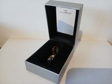 Infinite ladies silver tone wrist watch in box