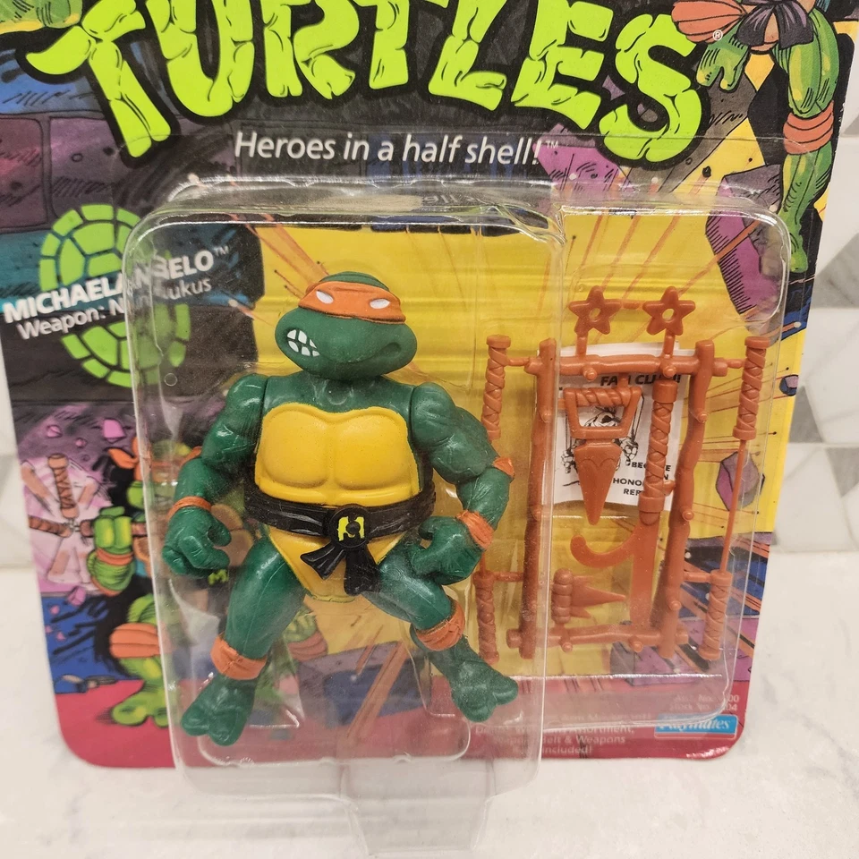 Figura de colección TMNT Tortugas Ninja Michaelangelo 1988 Playmates nueva en tarjeta Foto 2 de 4