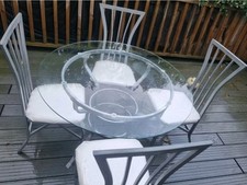 Table & 4 Chairs-Wipeable Seats.Photo In daylight For Condition but Kept Indoors