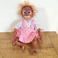 Reborn Baby Orangutan Monkey Doll Toy wearing Pink Pinafore Dress and Leggings