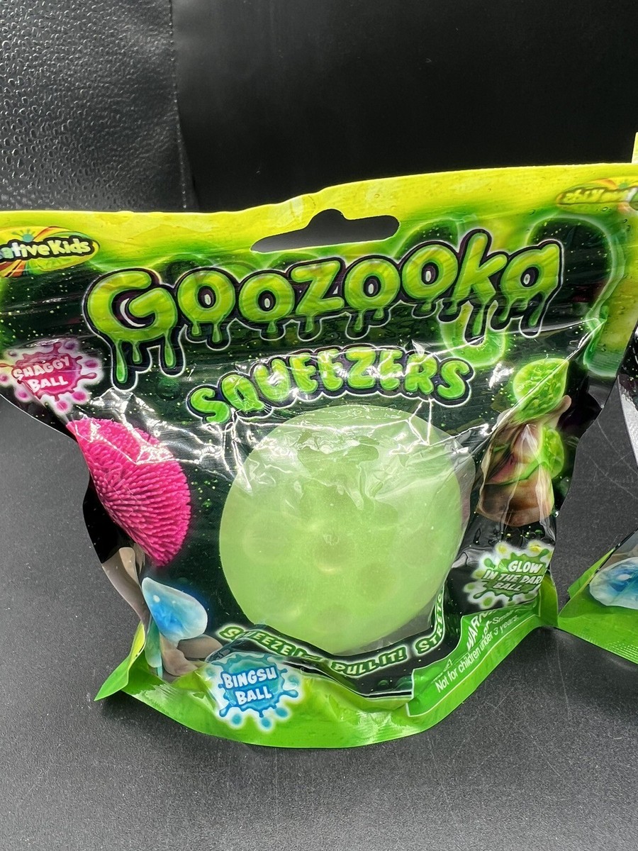 Goozooka Squeezers. Asst Case Of 24. Binsu. Shaggy. Glow. Stress
