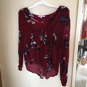 red flowy blouse