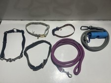 Lot Of Dog Collars And Leashes