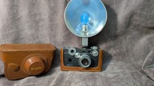 VINTAGE ORIGINAL ARGUS 50 MM CAMERA AND LEATHER CASE FOR DISPLAY