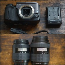 OLYMPUS E-300, 7952 shots, with two zoom lenses