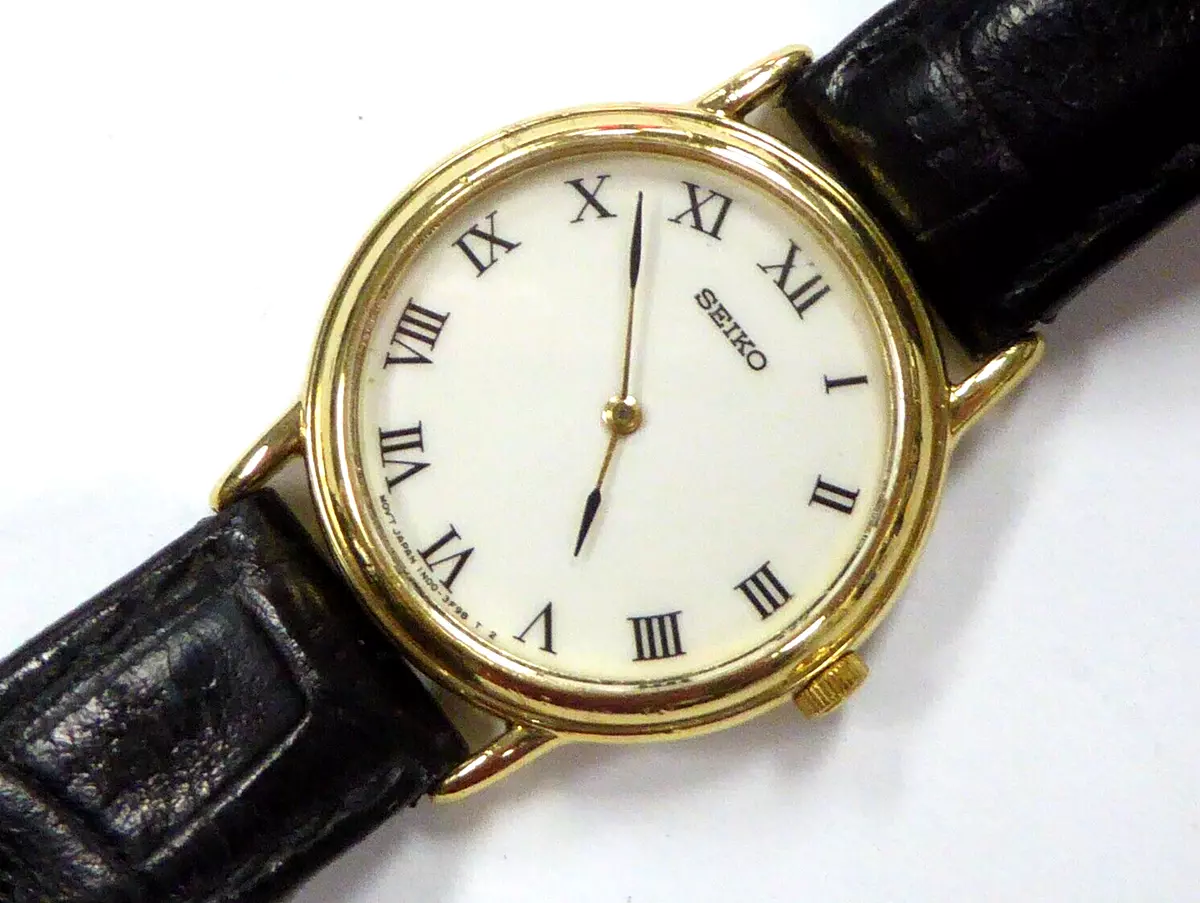 Seiko solid hotsell gold watch