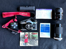 Canon AE-1 Program SLR Film Camera with Canon 50mm f/1.8 Lens, 3 Others More