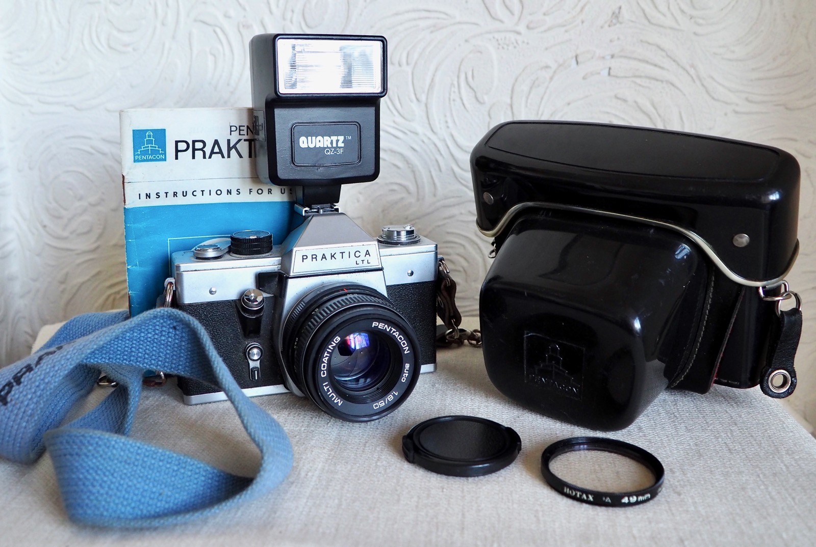 Vintage PRAKTICA LTL 35mm film SLR camera kit with lens and extras