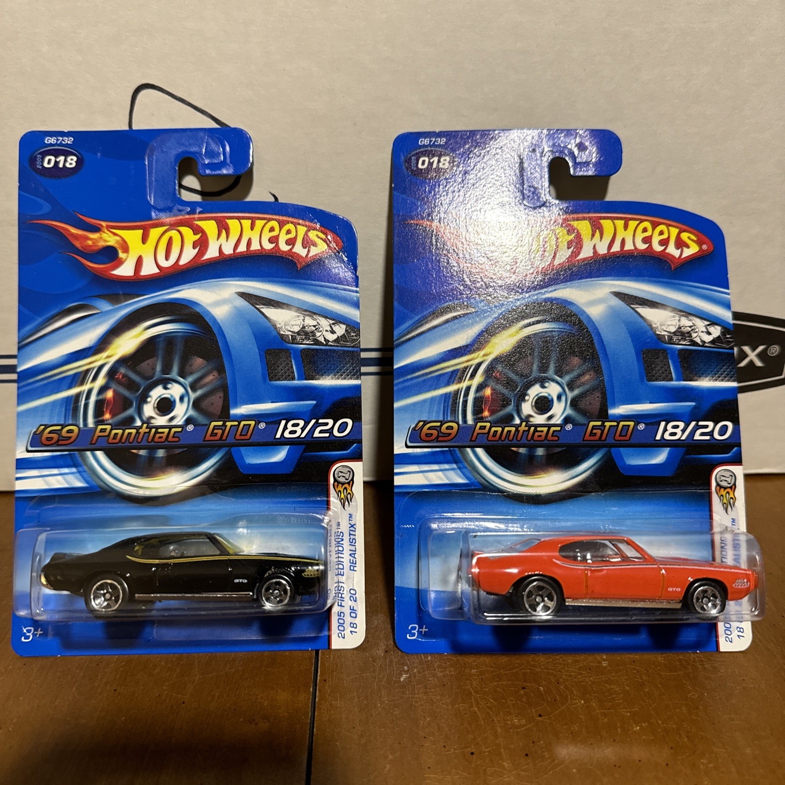 (2) Hot Wheels 69 Pontiac GTO 2005 1st Edition Realistix Read Description