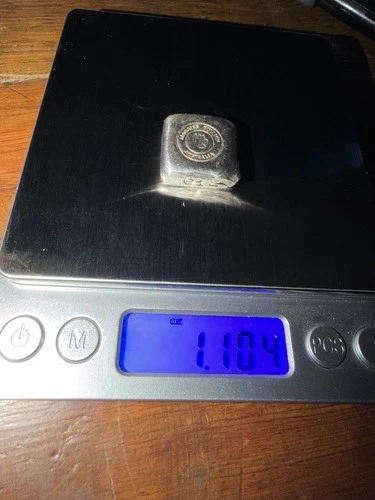 1 OZ FINE .999 SILVER POURED BAR MAGGIE B