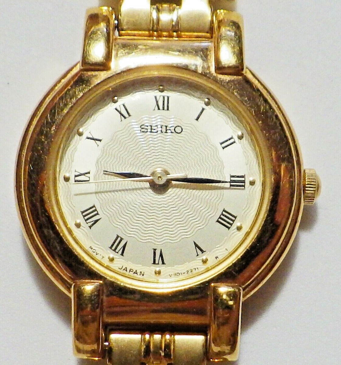 Ladies SEIKO Analog Quartz Watch V701 1781 Goldtone SS Panther