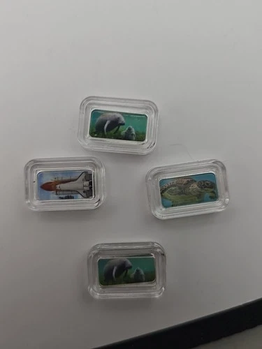 Lot Of (4) 1 Gram Colorized Rounds In Capsule-Manitee-Rocket Ship-Sea Turtle