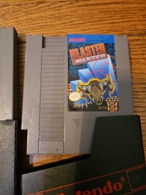 Nintendo NES Console Lot with 2 Controllers, 1 Zapper, 7 Games, and Cords