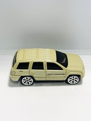 MAISTO 1999  JEEP GRAND CHEROKEE LIMITED  1/64 SCALE ,CHAMPANGE