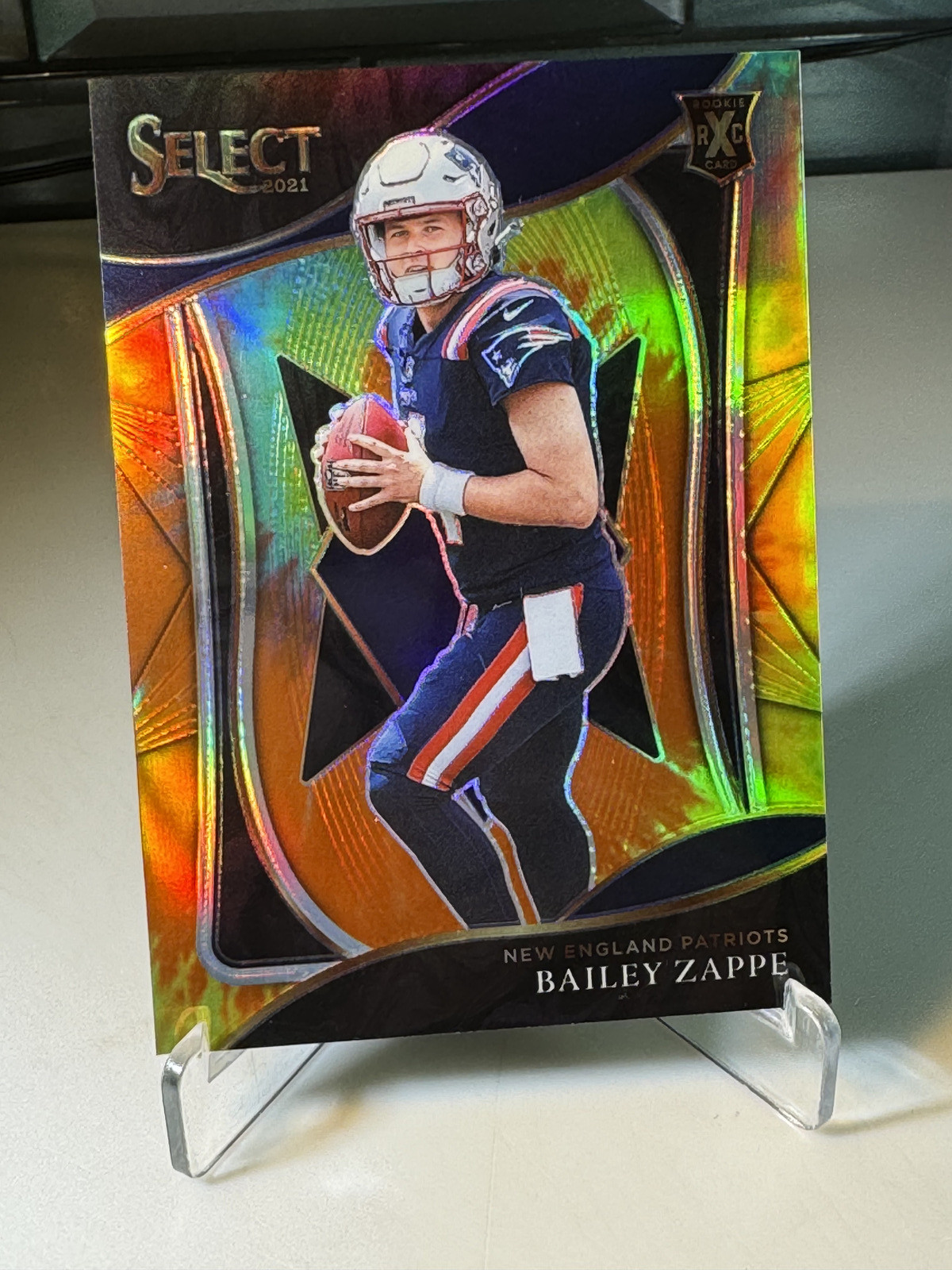 2021 Panini Select - 2022 XRC Prizm Tie-Dye Prizm #405 Bailey Zappe /25 (RC)