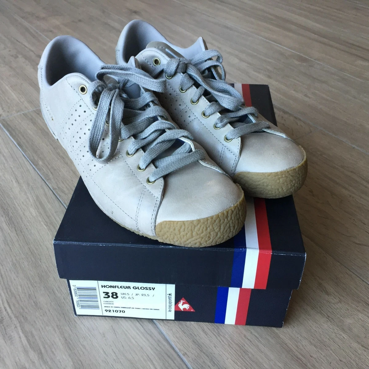 Sneakers Le Coq Sportif grigie e suola tinta cuoio in pelle numero