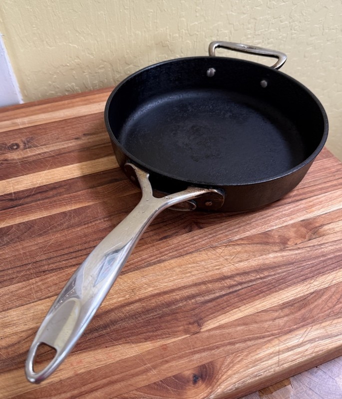 Lodge Rare Signature Series Stainless Handle Cast Iron Sits Flat
