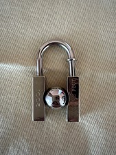 Hermes 2001 "Earth" Cadena Silver Lock Charm Preloved