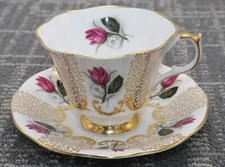 Queen Anne Pink Rose White Flower Teacup and Saucer England Bone China