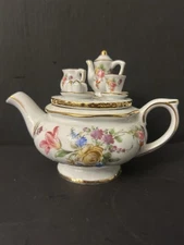 Unique 8 oz Floral Design Teapot  With Miniature Tea Set  As Design For Lid