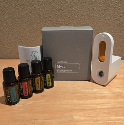 NIB doTERRA Myst Diffuser / Motion activated Plug In + 4 Essential