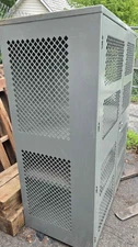 Grizzly Metal Storage Cabinet with Doors, Shelves and Lock.