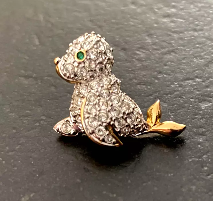 Signed SWAROVSKI Crystal Green Eye Baby Seal Gold Tone Small Brooch Lapel Pin