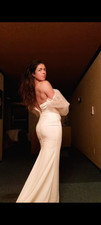 Brand new, never worn, wedding dress size 12, runs small